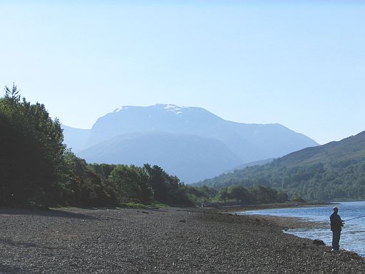 Ben Nevis, taken from the shores of loch linnhe.  It's hard to imagine that there's still snow up there.